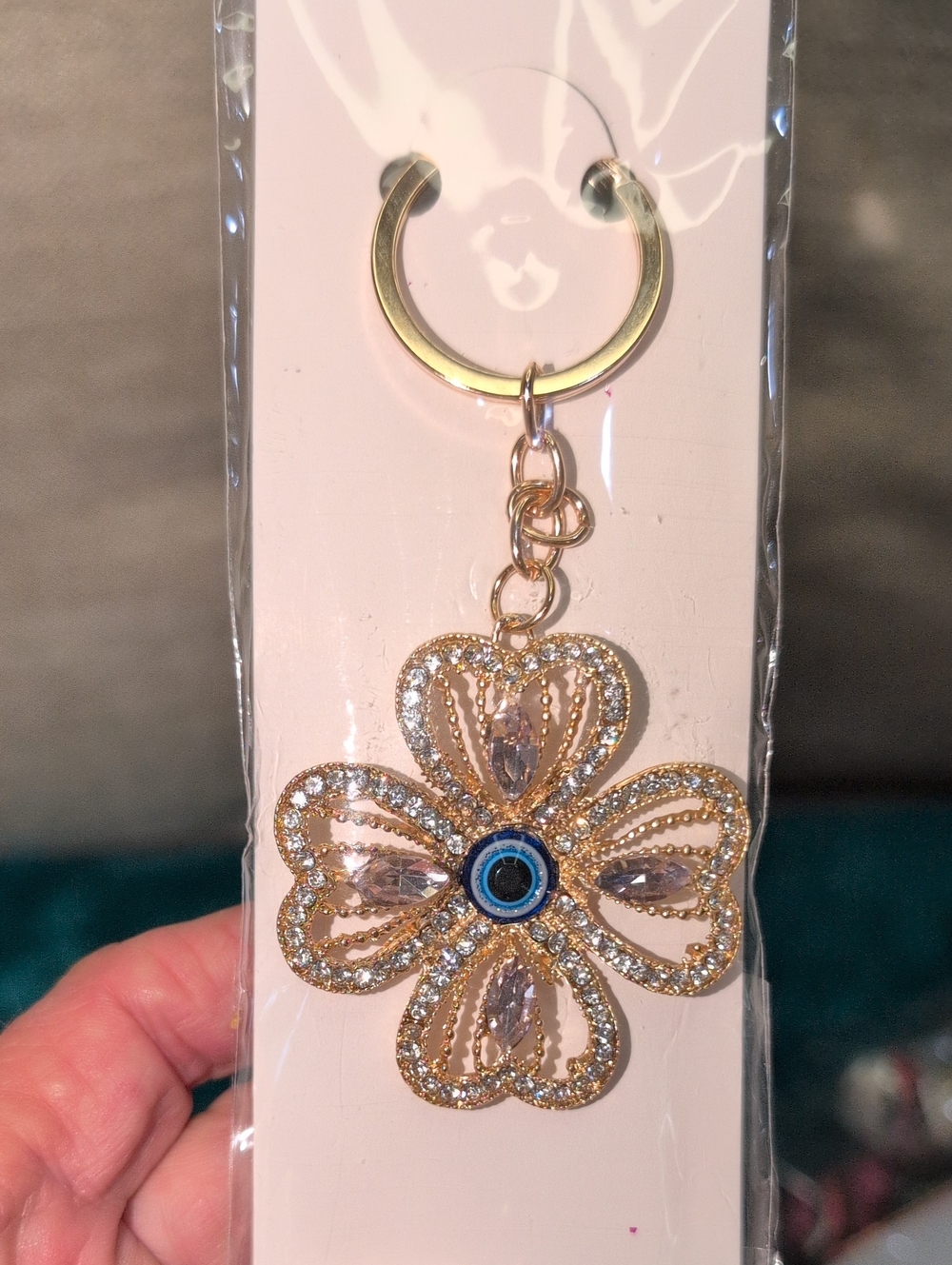 Gold Flower Crystal Keychain with Blue Eye Accent